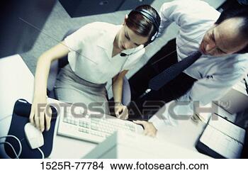 Stock Photo - people, desk, 
computer, business, 
customer service, 
indoors. fotosearch 
- search stock 
photos, pictures, 
images, and photo 
clipart