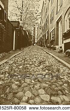 Stock Photo - buildings along 
a cobblestone 
street. fotosearch 
- search stock 
photos, pictures, 
images, and photo 
clipart