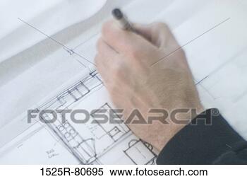 Stock Image - close-up of a 
human hand making 
a blueprint. fotosearch 
- search stock 
photos, pictures, 
images, and photo 
clipart