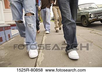 Stock Photo - low section view 
of five people 
walking on a sidewalk. 
fotosearch - search 
stock photos, 
pictures, images, 
and photo clipart