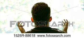 Stock Photo - man gazing into 
heaven with arms 
and hands open. 
fotosearch - search 
stock photos, 
pictures, images, 
and photo clipart