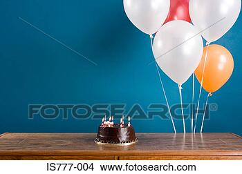 Stock Photo - birthday cake 
and balloons. 
fotosearch - search 
stock photos, 
pictures, images, 
and photo clipart