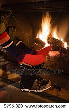 Stock Photography - feet of person 
by fire. fotosearch 
- search stock 
photos, pictures, 
images, and photo 
clipart