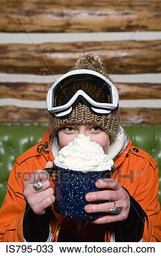 Stock Photo - young woman with 
hot chocolate. 
fotosearch - search 
stock photos, 
pictures, images, 
and photo clipart