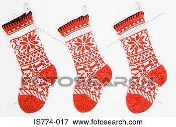 Picture - christmas stockings 
in a row. fotosearch 
- search stock 
photos, pictures, 
images, and photo 
clipart