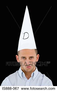 Picture - man wearing a 
dunce cap. fotosearch 
- search stock 
photos, pictures, 
images, and photo 
clipart
