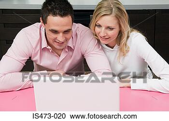 Stock Photography - couple using internet. 
fotosearch - search 
stock photos, 
pictures, images, 
and photo clipart