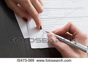 Stock Photograph - person signing 
document. fotosearch 
- search stock 
photos, pictures, 
images, and photo 
clipart