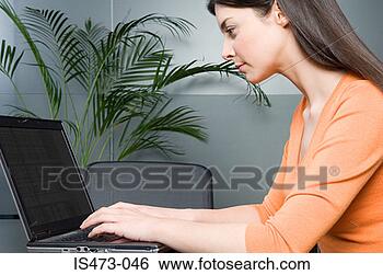 Stock Photo - woman typing on 
laptop. fotosearch 
- search stock 
photos, pictures, 
images, and photo 
clipart
