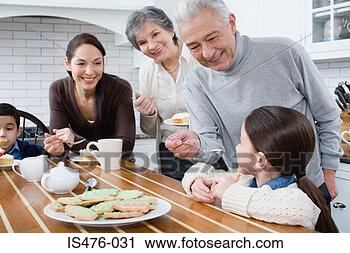 Stock Photography - family in kitchen. 
fotosearch - search 
stock photos, 
pictures, images, 
and photo clipart