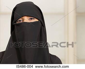 Stock Photo - woman wearing 
a burkha. fotosearch 
- search stock 
photos, pictures, 
images, and photo 
clipart