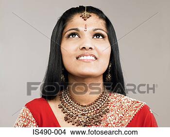 Stock Photo - young woman looking 
up. fotosearch 
- search stock 
photos, pictures, 
images, and photo 
clipart