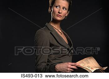 Stock Photo - businesswoman 
with newspaper. 
fotosearch - search 
stock photos, 
pictures, images, 
and photo clipart