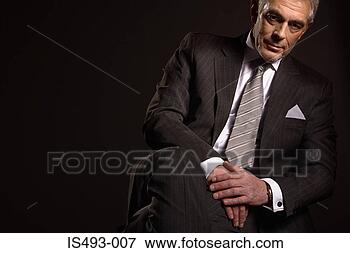 Picture - portrait of a 
businessman. fotosearch 
- search stock 
photos, pictures, 
images, and photo 
clipart