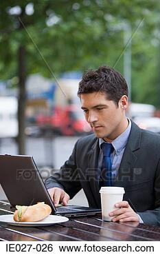 Stock Photo - businessman with 
lunch and laptop. 
fotosearch - search 
stock photos, 
pictures, images, 
and photo clipart