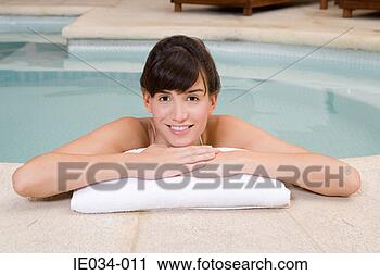 Stock Photography - young woman in 
swimming pool. 
fotosearch - search 
stock photos, 
pictures, images, 
and photo clipart