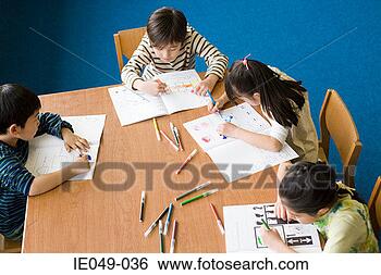 Stock Photo - school children 
colouring in. 
fotosearch - search 
stock photos, 
pictures, images, 
and photo clipart