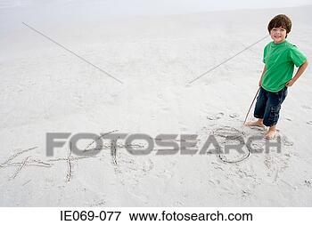 Picture - boy doing mathematics 
on the beach. 
fotosearch - search 
stock photos, 
pictures, images, 
and photo clipart
