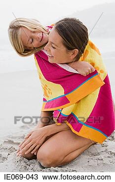 Stock Photo - mother and daughter 
in a towel. fotosearch 
- search stock 
photos, pictures, 
images, and photo 
clipart