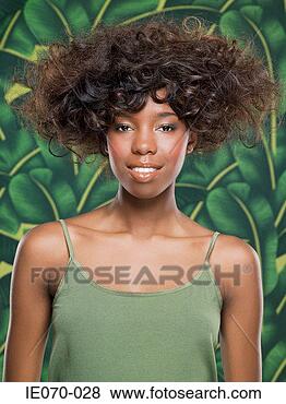 Stock Photo - portrait of a 
woman and leaf 
background. fotosearch 
- search stock 
photos, pictures, 
images, and photo 
clipart