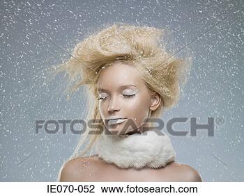 Stock Photo - serene woman in 
the snow. fotosearch 
- search stock 
photos, pictures, 
images, and photo 
clipart