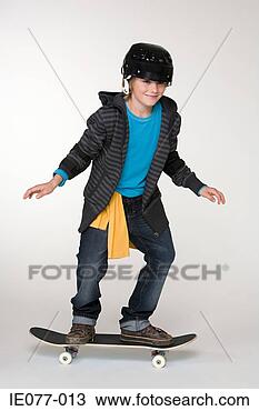 Stock Photo - a boy skateboarding. 
fotosearch - search 
stock photos, 
pictures, images, 
and photo clipart