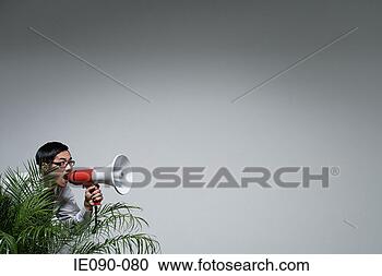 Stock Photography - an office worker 
shouting on a 
loudspeaker. fotosearch 
- search stock 
photos, pictures, 
images, and photo 
clipart