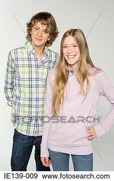 Stock Photograph - portrait of a 
teenage boy and 
teenage girl. 
fotosearch - search 
stock photos, 
pictures, images, 
and photo clipart