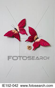Stock Photo - fake butterflies 
on a lightswitch. 
fotosearch - search 
stock photos, 
pictures, images, 
and photo clipart