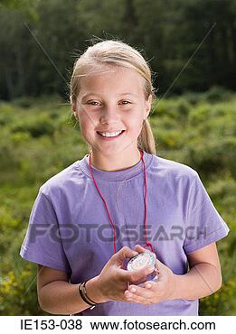 Stock Photo - girl with compass. 
fotosearch - search 
stock photos, 
pictures, images, 
and photo clipart
