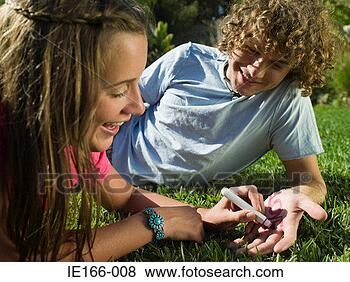 Stock Photo - couple writing 
on their hands. 
fotosearch - search 
stock photos, 
pictures, images, 
and photo clipart