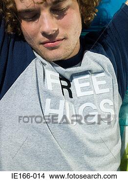 Stock Photo - young man with 
his eyes closed. 
fotosearch - search 
stock photos, 
pictures, images, 
and photo clipart