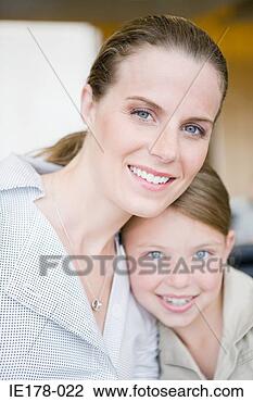 Stock Photo - portrait of a 
mother and daughter. 
fotosearch - search 
stock photos, 
pictures, images, 
and photo clipart