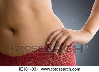 Picture - woman with hand 
on hip. fotosearch 
- search stock 
photos, pictures, 
images, and photo 
clipart