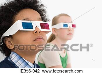 Stock Photo - boy and girl in 
3d glasses. fotosearch 
- search stock 
photos, pictures, 
images, and photo 
clipart