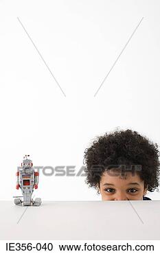 Stock Photography - boy and robot. 
fotosearch - search 
stock photos, 
pictures, images, 
and photo clipart
