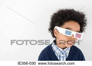 Stock Photography - boy wearing 3d 
glasses. fotosearch 
- search stock 
photos, pictures, 
images, and photo 
clipart