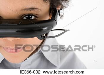 Stock Photo - boy wearing virtual 
reality headset. 
fotosearch - search 
stock photos, 
pictures, images, 
and photo clipart