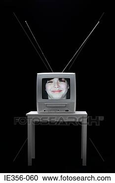 Stock Photography - face of a boy 
on television. 
fotosearch - search 
stock photos, 
pictures, images, 
and photo clipart