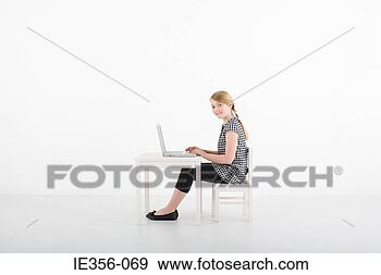 Stock Photograph - girl using laptop. 
fotosearch - search 
stock photos, 
pictures, images, 
and photo clipart