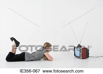 Picture - girl watching 
television. fotosearch 
- search stock 
photos, pictures, 
images, and photo 
clipart