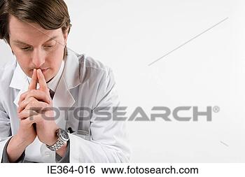 Stock Photo - pensive scientist. 
fotosearch - search 
stock photos, 
pictures, images, 
and photo clipart