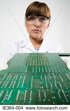 Stock Photo - scientist with 
circuit board. 
fotosearch - search 
stock photos, 
pictures, images, 
and photo clipart