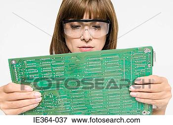 Picture - scientist with 
circuit board. 
fotosearch - search 
stock photos, 
pictures, images, 
and photo clipart