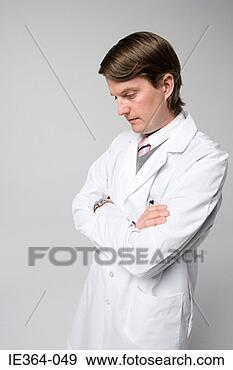 Stock Photograph - scientist with 
crossed arms. 
fotosearch - search 
stock photos, 
pictures, images, 
and photo clipart