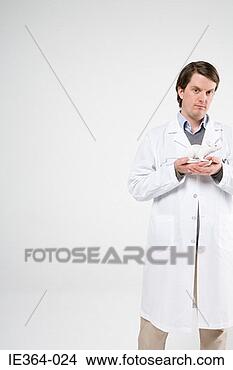 Stock Photo - scientist holding 
a rat. fotosearch 
- search stock 
photos, pictures, 
images, and photo 
clipart