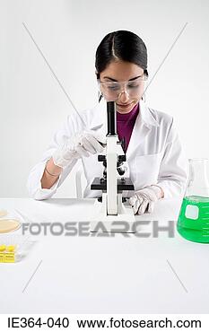 Stock Photography - scientist with 
microscope. fotosearch 
- search stock 
photos, pictures, 
images, and photo 
clipart