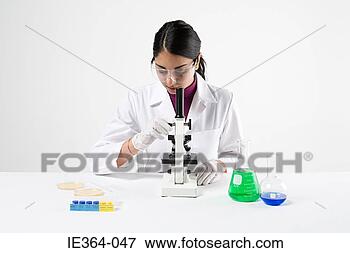Picture - scientist with 
microscope. fotosearch 
- search stock 
photos, pictures, 
images, and photo 
clipart