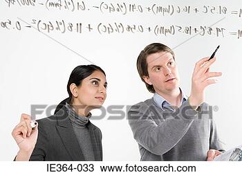 Stock Photo - scientists with 
formula. fotosearch 
- search stock 
photos, pictures, 
images, and photo 
clipart