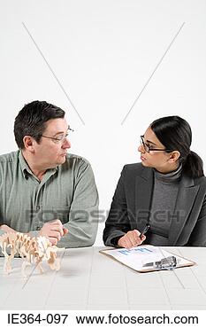 Picture - scientists with 
model dinosaur. 
fotosearch - search 
stock photos, 
pictures, images, 
and photo clipart